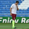Bayern Munich's defender Mats Hummels looks down and wipes his face during a training session at the Santiago Bernabeu stadium in Madrid in Madrid on April 17, 2017