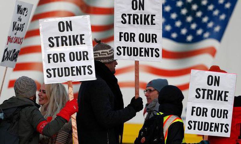 West Virginia teachers walk out (again) and score a win in hours