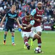 West Ham United's midfielder Dimitri Payet (L) scores against Middlesbrough at The London Stadium, in east London on October 1, 2016