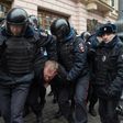 Russian police officers detain a man in central Moscow on April 2, 2017, as Russian opposition promised protests after police detained hundreds of people during anti-corruption rallies