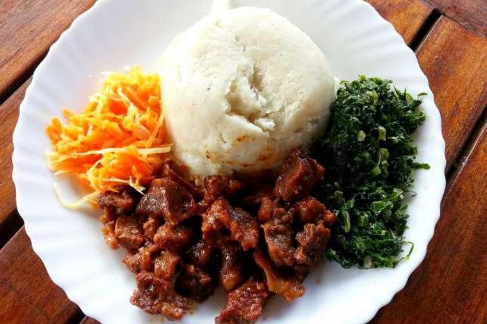 Kenya's popular dish of Ugali, beef and sukumawiki.