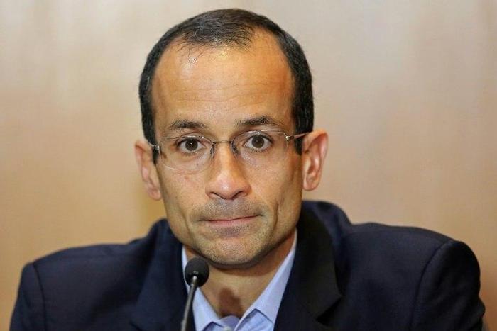 A source told AFP 77 current and former Odebrecht executives, including the firm's jailed boss Marcelo Odebrecht, seen in 2015, had signed a plea deal in relation to a corruption scandal to cooperate with prosecutors in return for lighter sentences