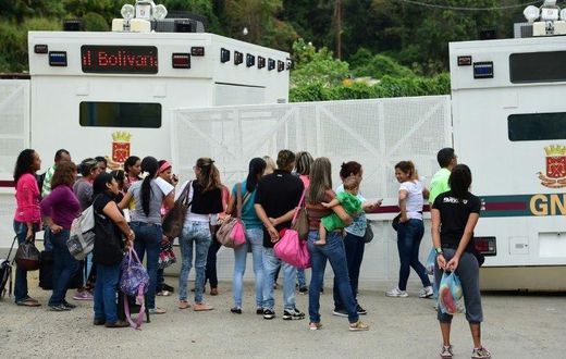Protesters outside a prison east of Caracas where opposition leader Leopoldo Lopez in being held