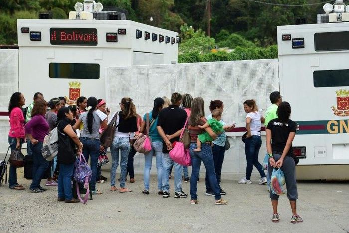 Protesters outside a prison east of Caracas where opposition leader Leopoldo Lopez in being held