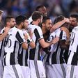 Juventus players celebrate after winning the Italian Tim Cup final on May 17, 2017 at the Olympic stadium in Rome