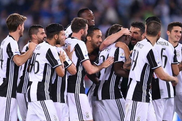 Juventus players celebrate after winning the Italian Tim Cup final on May 17, 2017 at the Olympic stadium in Rome