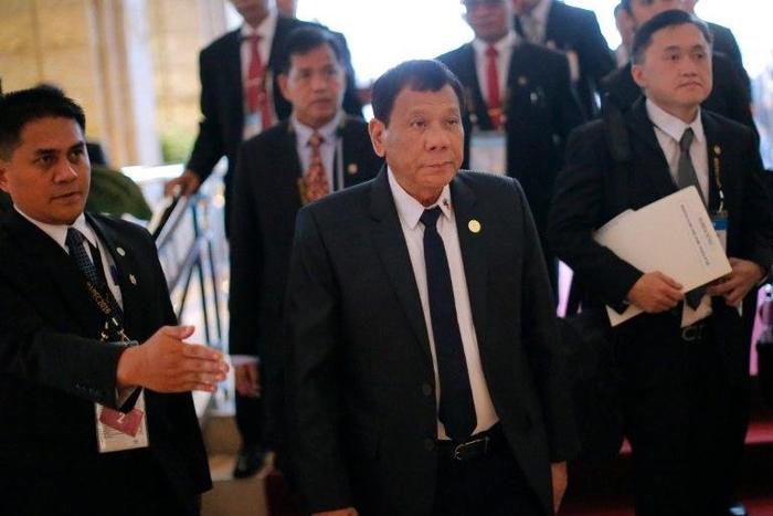 Philippine President Rodrigo Duterte arrives for a bilateral meeting with Russia's President Vladimir Putin on the sidelines of the Asia-Pacific Economic Cooperation Summit in Lima on November 19, 2016