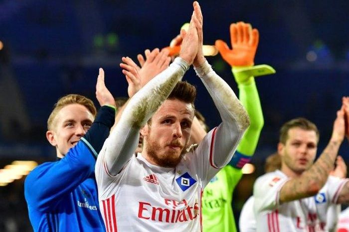 Hamburg players celebrate after the German First division Bundesliga football match between Hamburg SV and Hertha Berlin, on March 5, 2017