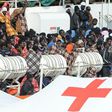 Would be immigrants wait to disembark in the port of Catania, on the island of Sicily on March 21, 2017 from the ship "Aquarius" following a rescue operation in the Mediterranean sea, where some 946 would be immigrants have been rescued