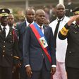 New Haitian President Jovenel Moise reviews and greets the troops during his inauguration ceremony at the National Palace, in Port-au-Prince, on February 7, 2017