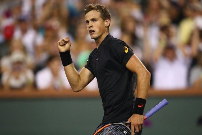 Vasek Pospisil of Canada celebrates scoring a point during his straight sets win against Andy Murray of Britain in their BNP Paribas Open second round match, at Indian Wells Tennis Garden in California, on March 11, 2017