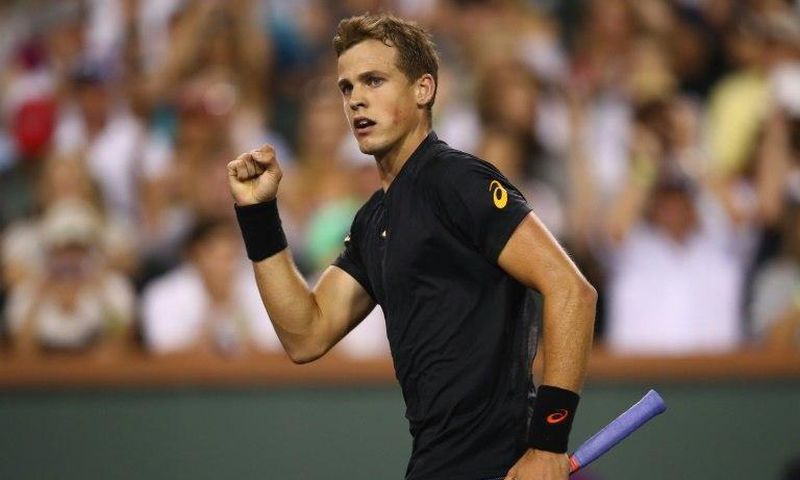 Vasek Pospisil of Canada celebrates scoring a point during his straight sets win against Andy Murray of Britain in their BNP Paribas Open second round match, at Indian Wells Tennis Garden in California, on March 11, 2017