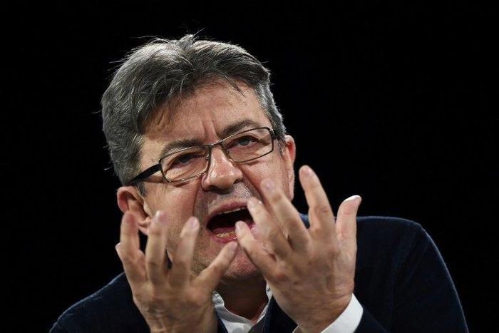French presidential election candidate for the far-left coalition La France insoumise Jean-Luc Melenchon gestures as he delivers a speech during a campaign rally on April 2, 2017, in Deols, central France