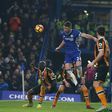 Chelsea's Gary Cahill jumps to head teh ball past Hull City's goalkeeper Eldin Jakupovic during the match at Stamford Bridge in London on January 22, 2017