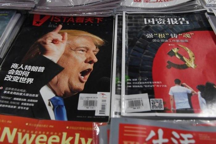 A magazine featuring US President-elect Donald Trump is seen at a bookstore in Beijing on December 12, 2016