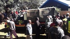 File image of Police Officers and members of the public at a scene of crime