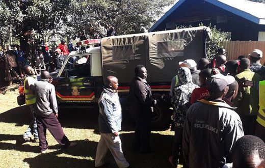 File image of Police Officers and members of the public at a scene of crime