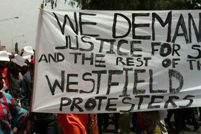 People demonstrate in Banjul following the death in custody of a senior figure in Gambia's main opposition