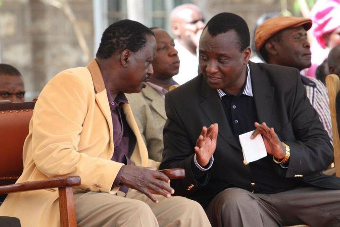 Nasa leader Raila Odinga (left) and lawyer Gitobu Imanyara consult during a past event.