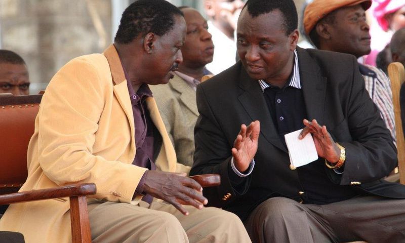 Nasa leader Raila Odinga (left) and lawyer Gitobu Imanyara consult during a past event.