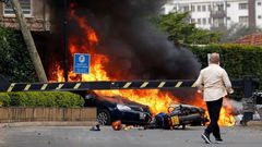 Vehicles burning during the Dusit D2 attack