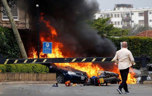 Vehicles burning during the Dusit D2 attack