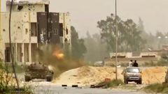 A tank in clashes on the outskirts of the Libyan capital Tripoli