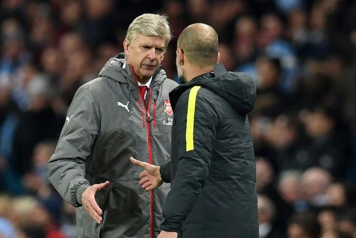 Arsenal manager Arsene Wenger (left) shakes hands with his Manchester City counterpart Pep Guardiola after a 2-1 defeat for the north London side at the Etihad Stadium in December 2016