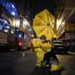 A protester holds a yellow umbrella as she protests in Hong Kong, early on November 7, 2016