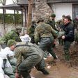 Soldiers help residents of Pierrefonds after heavy flooding caused by unrelenting rain