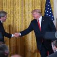 US President Donald Trump shakes hands with Italian Prime Minister Paolo Gentiloni during a joint press conference at the White House in Washington, DC, April 20, 2017