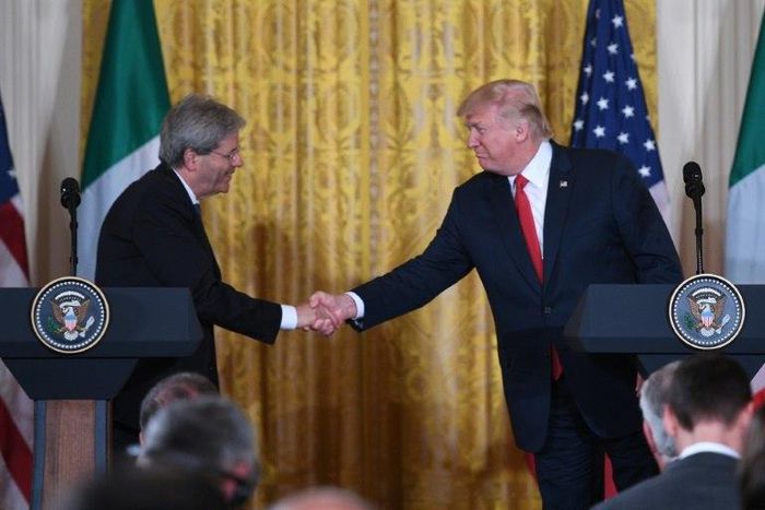 US President Donald Trump shakes hands with Italian Prime Minister Paolo Gentiloni during a joint press conference at the White House in Washington, DC, April 20, 2017