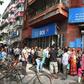 People queue outside a bank in Kolkata to deposit and exchange 500 and 1000 currency notes after the government's shock decision to withdraw them from circulation