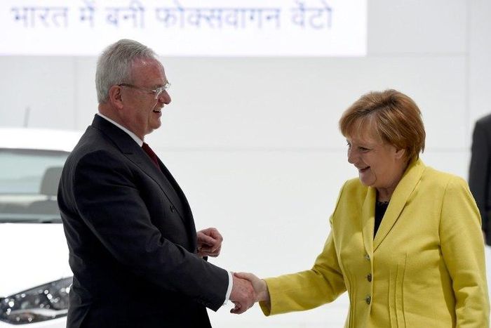 German lawmakers will be asking Chancellor Angela Merkel, pictured here with Volkswagen's then-CEO Martin Winterkorn in April 2015, about the extent of her government's support for the carmaker