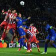 Leicester City's striker Leonardo Ulloa (3R) vies with Atletico Madrid's defender Stefan Savic (2R) during the UEFA Champions League quarter-final second leg football match April 18, 2017