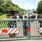 Riot policemen stand at the entrance of the Kourou space center (Centre Spatial Guyanais) during a protest over security and the state of the economy on April 4, 2017 in Kourou, French Guiana