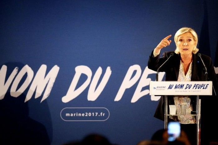 French presidential election candidate for the far-right Front National (FN) party Marine Le Pen delivers a speech during a campaign meeting in Arcis-sur-Aube, eastern France, on April 11, 2017