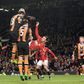 Manchester United's striker Zlatan Ibrahimovic (C) attempts an overhead kick but fails to score during the English Premier League football match against Hull City February 1, 2017