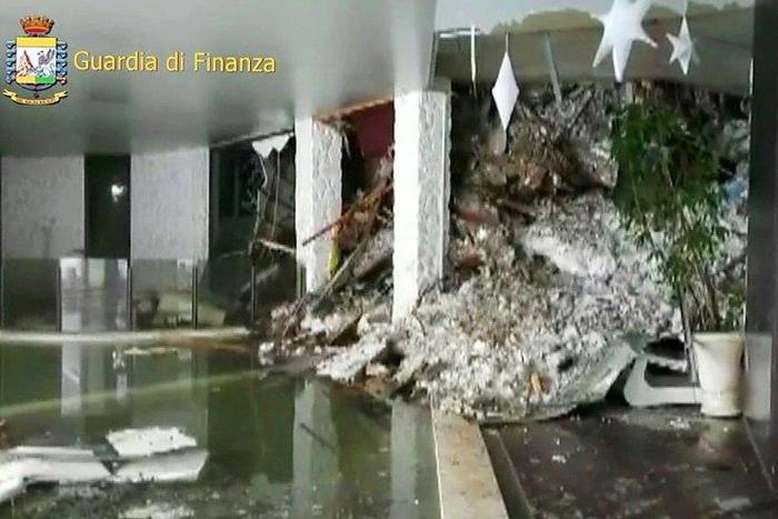 Image grab made from a video released by Italy's Guardia di Finanza on January 19, 2017 shows a wall of snow inside the Hotel Rigopiano, near the village of Farindola, on the eastern lower slopes of the Gran Sasso mountain, central Italy