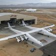 The Stratolaunch plane is pushed out of the hanger for the first time in the Mojave desert, California on May 31, 2017