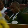 Janet Kanini's husband during her requiem service