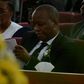 Janet Kanini's husband during her requiem service