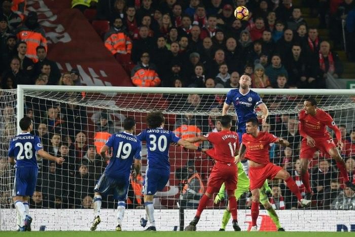 Chelsea's defender Gary Cahill (3R) jumps above Liverpool's defender Dejan Lovren (2R) as they vie for the ball during the English Premier League football match January 31, 2017