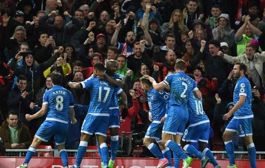 Bournemouth's striker Joshua King (2nd L) celebrates with teammates after scoring their second goal during the English Premier League football match between Liverpool and Bournemouth at Anfield in Liverpool, north west England on April 5, 2017