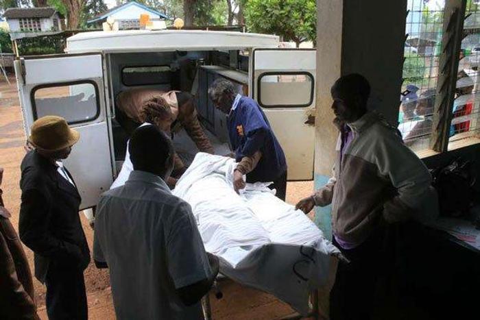 An accident victim, is carried into an ambulance at Karatina sub county hospital after hours of waiting without assistance on December 5, 2016 as doctors went on strike.