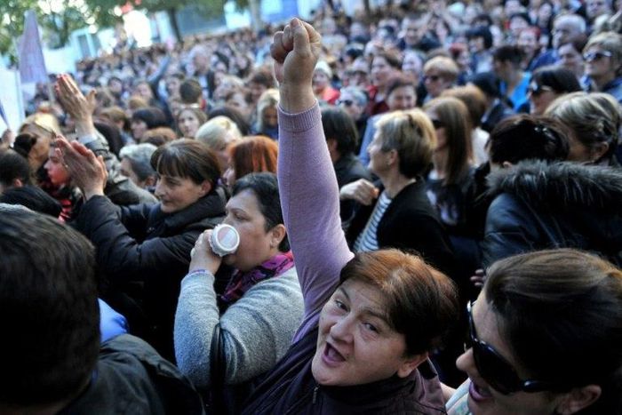 Women gather for a protest on February 16, 2017 in Podgorica over social benefits cuts affecting mothers with three or more children, introduced as the country is facing growing public finances problems