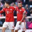 Robert Lewandowski (left) netted twice Bayern Munich went 10 points clear in the Bundesliga