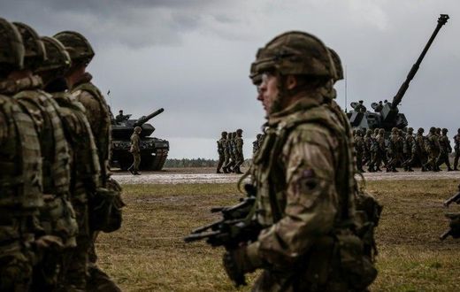 US and Polish troops take part in the official welcoming ceremony for NATO troops - part of The Enhanced Forward Presence, in Orzysz, Poland April 13, 2017