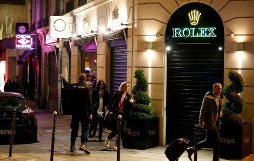 As a shooter opened fire on a police vehicle killing one officer and wounding two in Paris's famed Champs Elysees bystanders and tourists dashed for safety