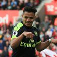 Arsenal's striker Alexis Sanchez celebrates after scoring their third goal during the English Premier League football match against Stoke City May 13, 2017